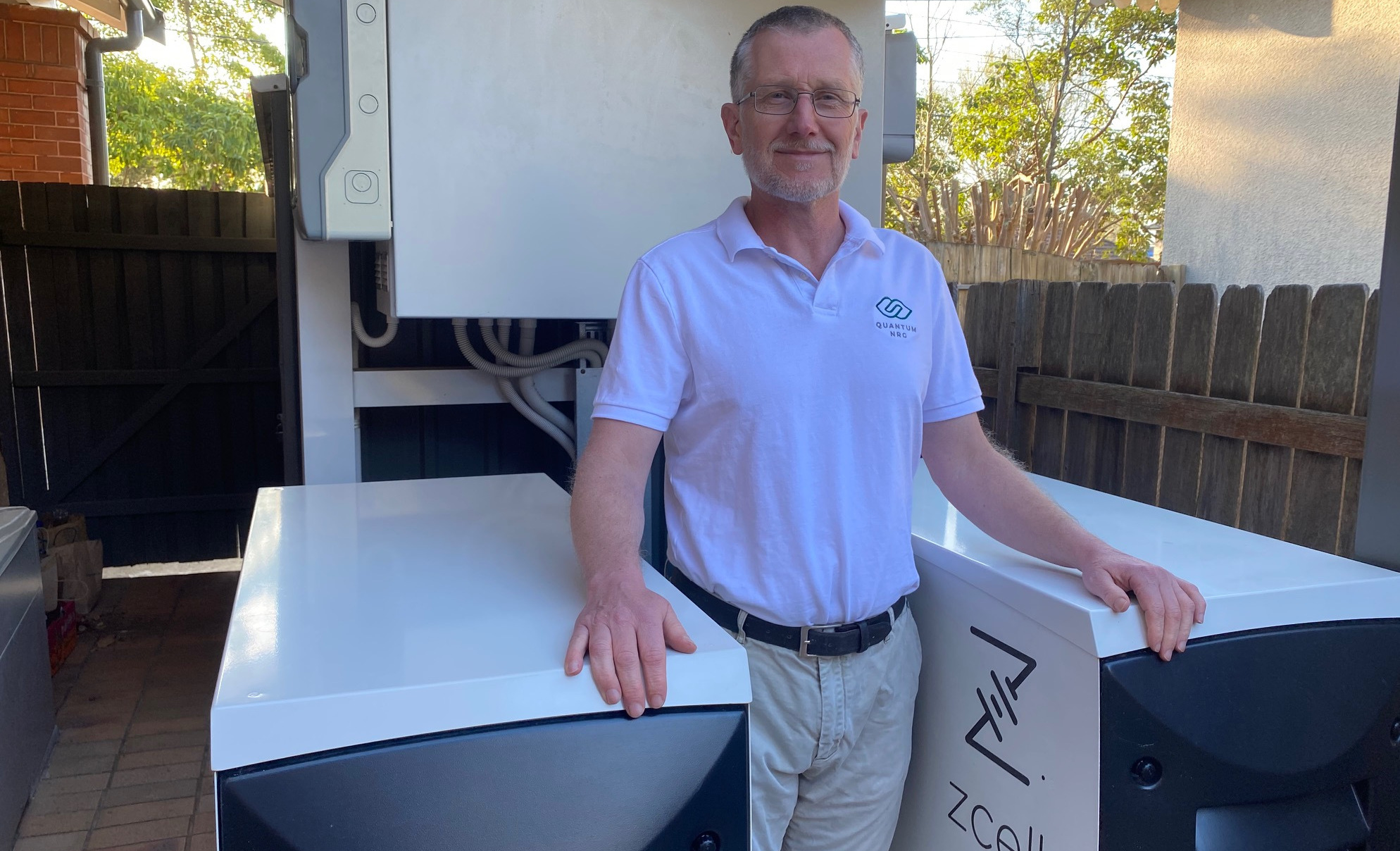 Aidan Moore with Redflow's Z-Cell Batteries